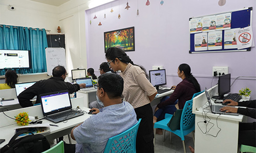 Students working together on digital marketing strategy Pune